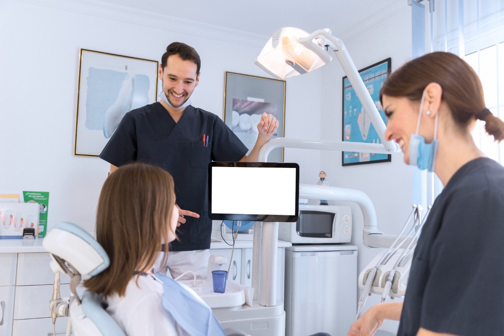 Dentist and patient in a safe clinical environment